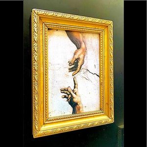 Michelangelo’s God and Adam
